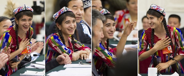Riyangul Almire, a deputy from Xinjiang Uygur autonomous region to the 12th National People's Congress (NPC) attends a group discussion by the Xinjiang delegation in Beijing, March 10, 2013. Struggle for change in remote areas