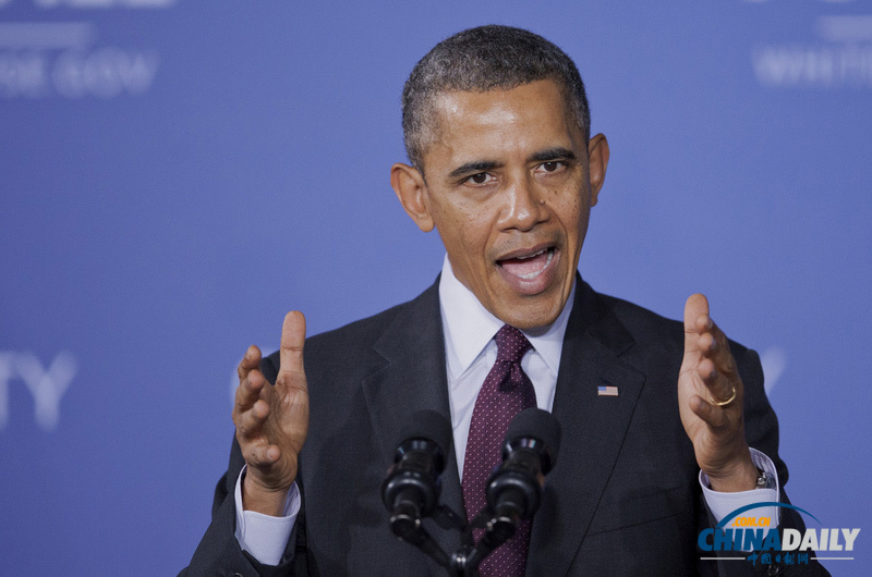 奧巴馬教室內(nèi)玩ipad 承諾向學校推廣無線科技