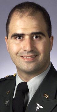 胡德堡嫌犯被控13項殺人罪 奧巴馬要求調(diào)查監(jiān)控責任