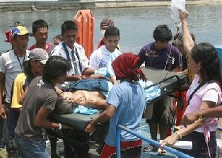 菲武裝分子血洗村莊11人亡 遭綁仨月兩中國公民獲救