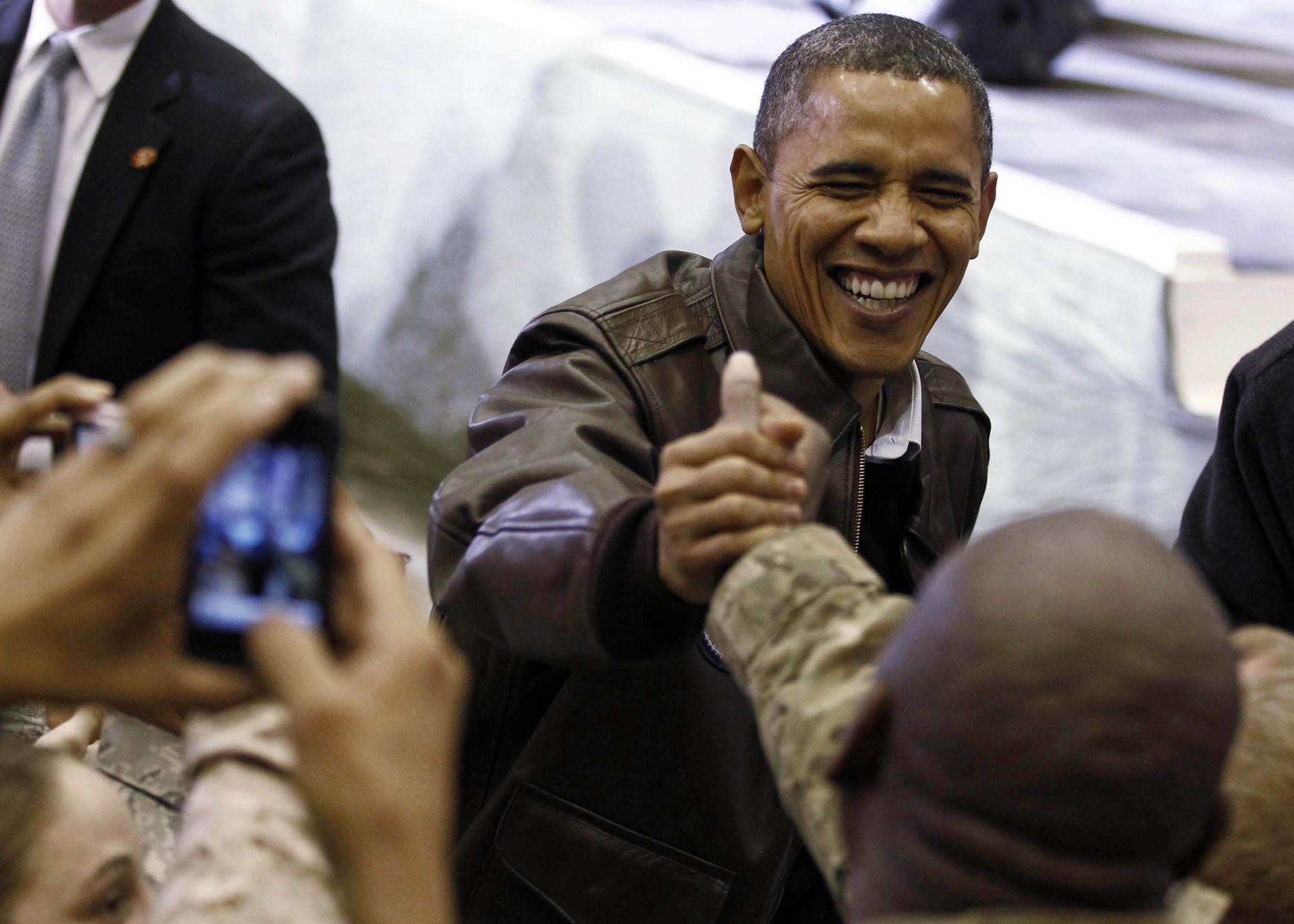 奧巴馬首次特赦罪犯 3日晚秘密前往阿富汗慰問(wèn)美軍