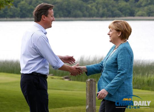 八國集團峰會開幕 卡梅倫:必須插手?jǐn)⒗麃喚謩? style=