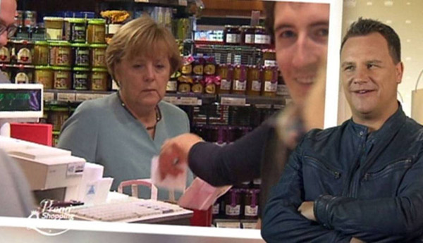 默克爾商場(chǎng)購物時(shí)“闖入”電視節(jié)目拍攝現(xiàn)場(chǎng)