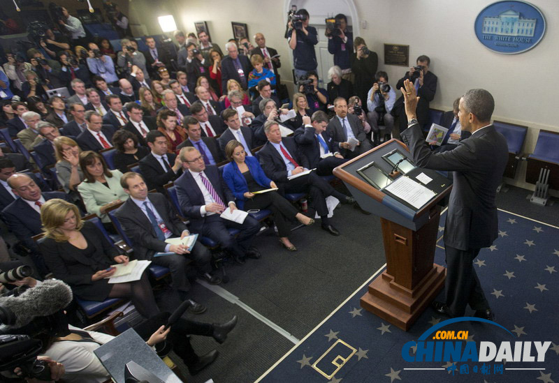 奧巴馬舉行年終新聞發(fā)布會 笑容滿面心情不錯