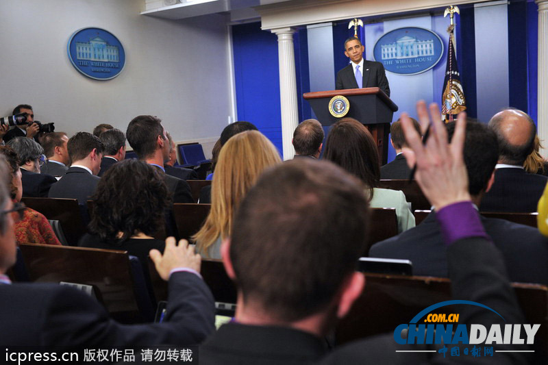 奧巴馬舉行年終新聞發(fā)布會(huì) 笑容滿面心情不錯(cuò)